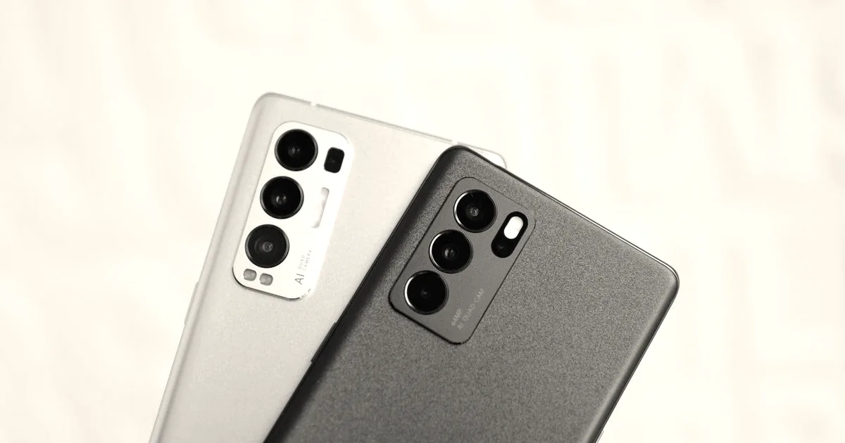 Close-up of two smartphones showcasing triple camera technology in modern design.