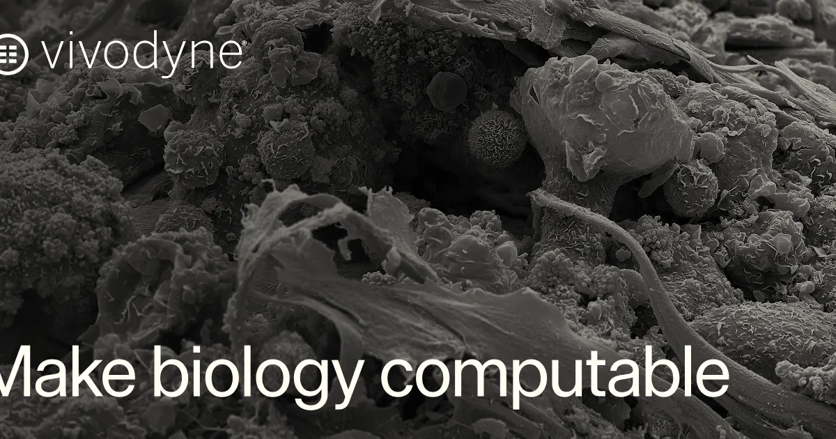 Microscopic view of cellular biology structures overlaid with the text Make biology computable and Vivodyne logo