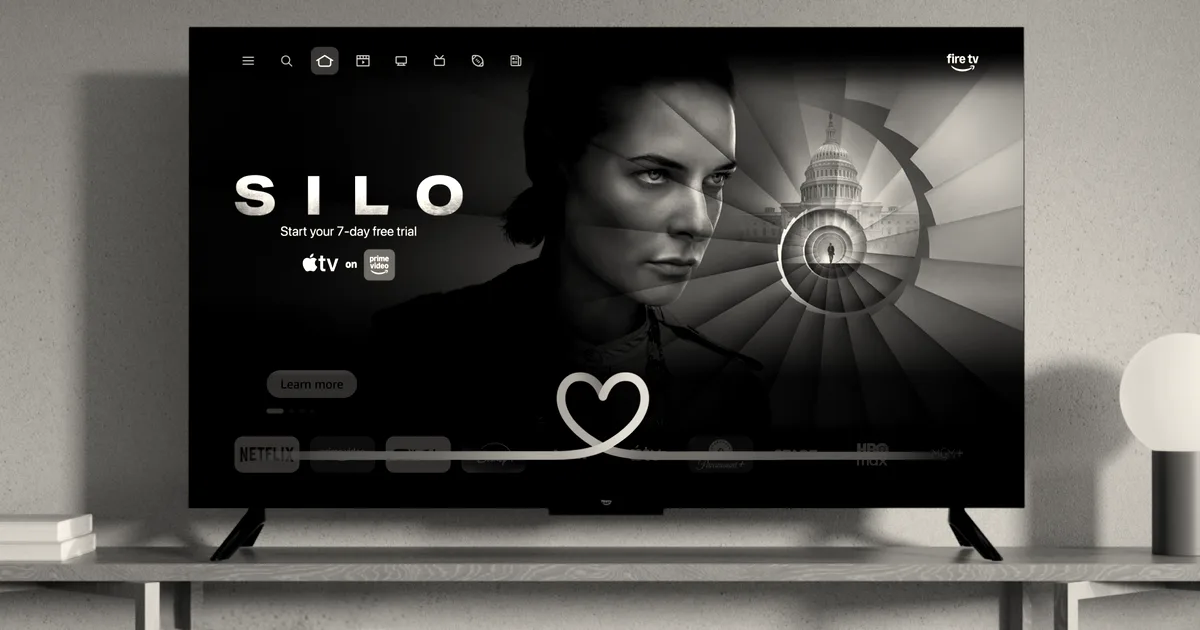 Amazon Fire TV screen displaying the show Silo with an Alexa glowing blue light bar overlay.