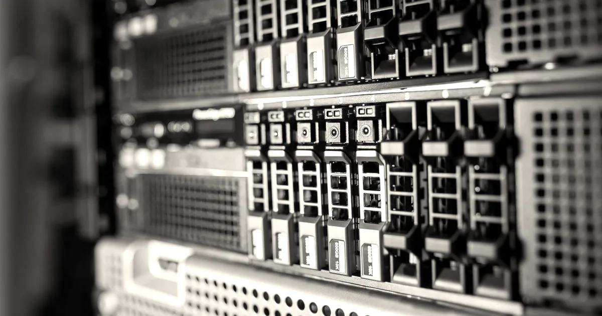 Close-up view of server drive bays and hardware inside a modern data center rack.