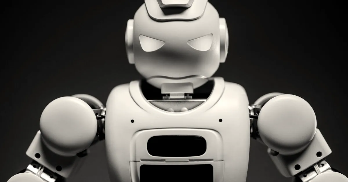 Detailed studio shot of a modern robotic toy with a dark background, showcasing technological design.
