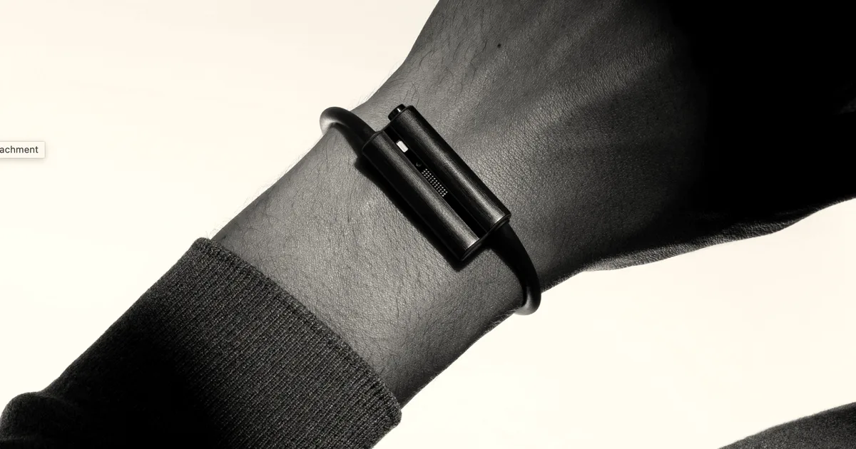 A person's wrist wearing the black Luffu Link LTE health and safety band.