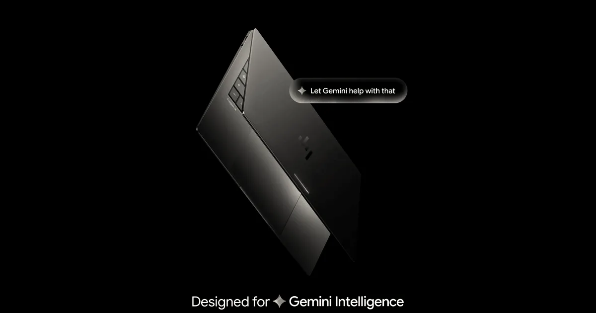 A sleek dark blue Googlebook laptop angled against a black background with a glowing Gemini intelligence speech bubble.