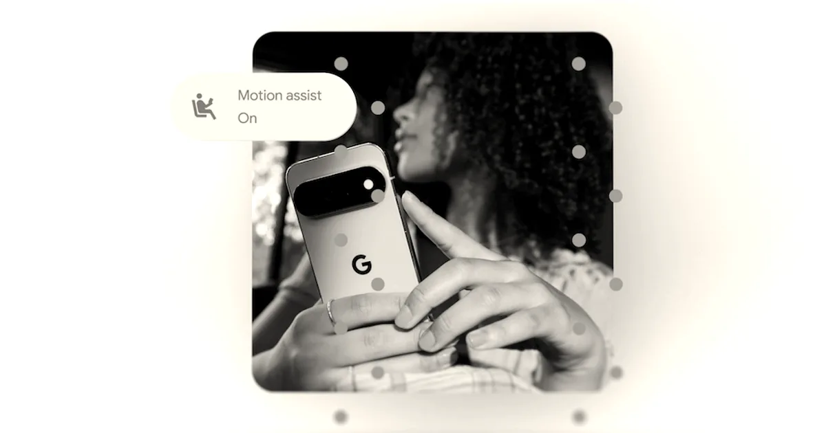 A person holding a Google Pixel phone displaying dots around the screen edge for Motion Assist.