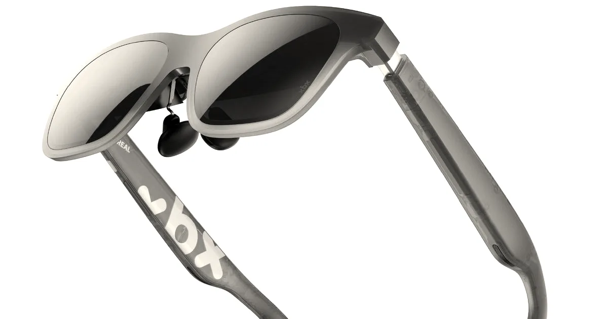 XREAL augmented reality glasses with blue tinted reflective lenses against a white background
