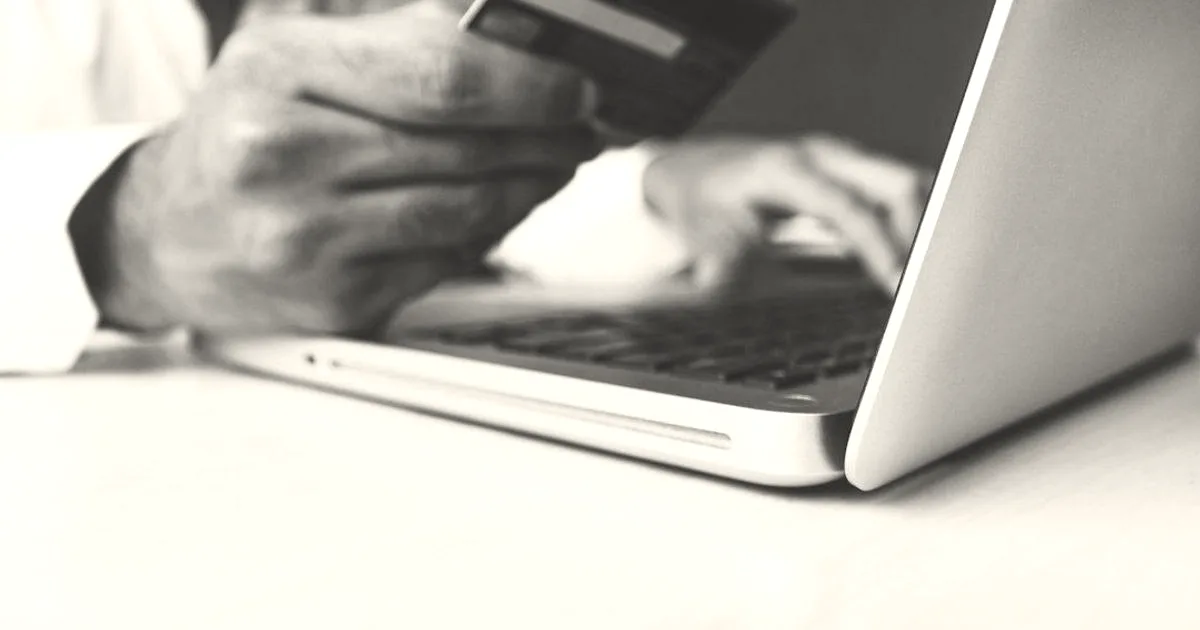 Stock photo of the Business Man with a credit card by rupixen