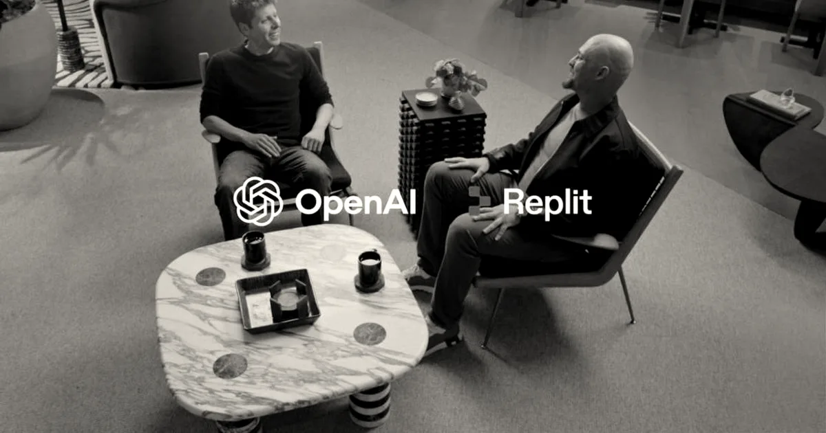 Two men seated in armchairs in a modern lounge area conversing with OpenAI and Replit logos overlaid.