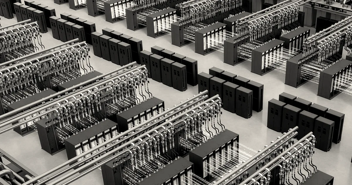 An expansive modern data center facility featuring rows of computer server racks connected by extensive cabling.