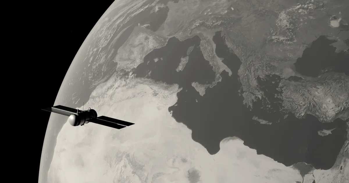 A modern satellite orbiting planet Earth with the Mediterranean Sea and European continent visible below