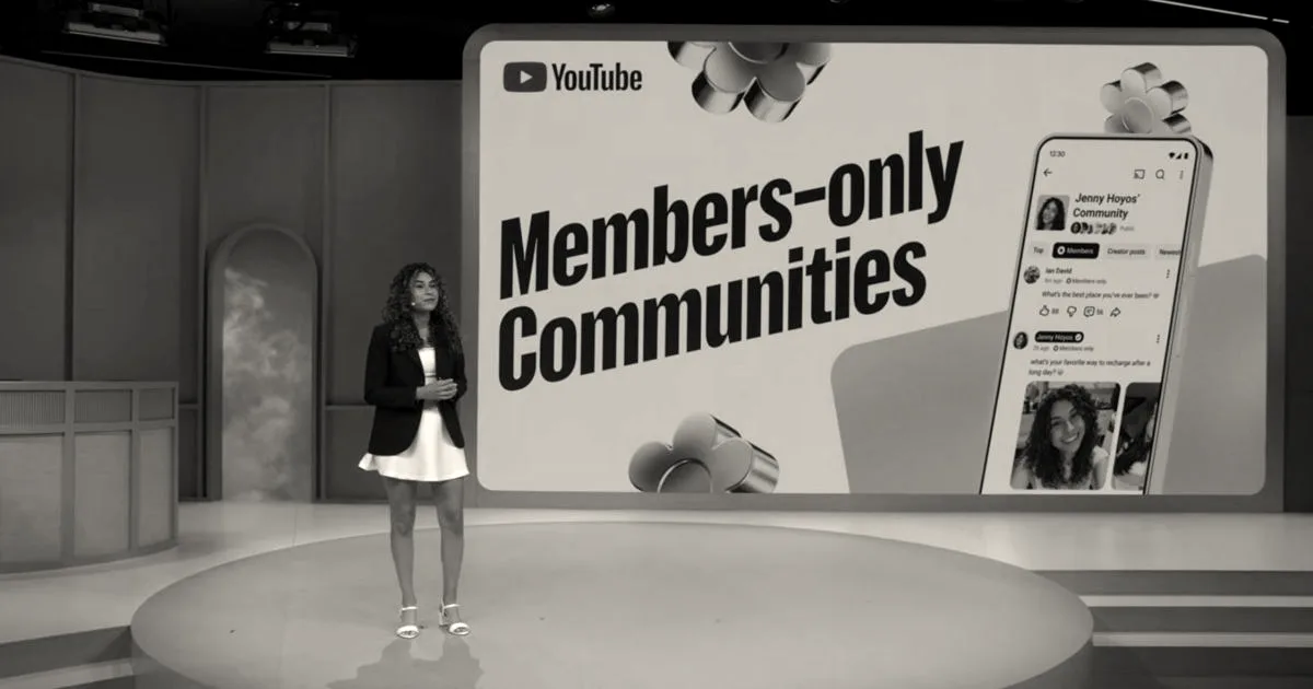 A presenter standing on a stage in front of a screen displaying YouTube Members-only Communities feature.